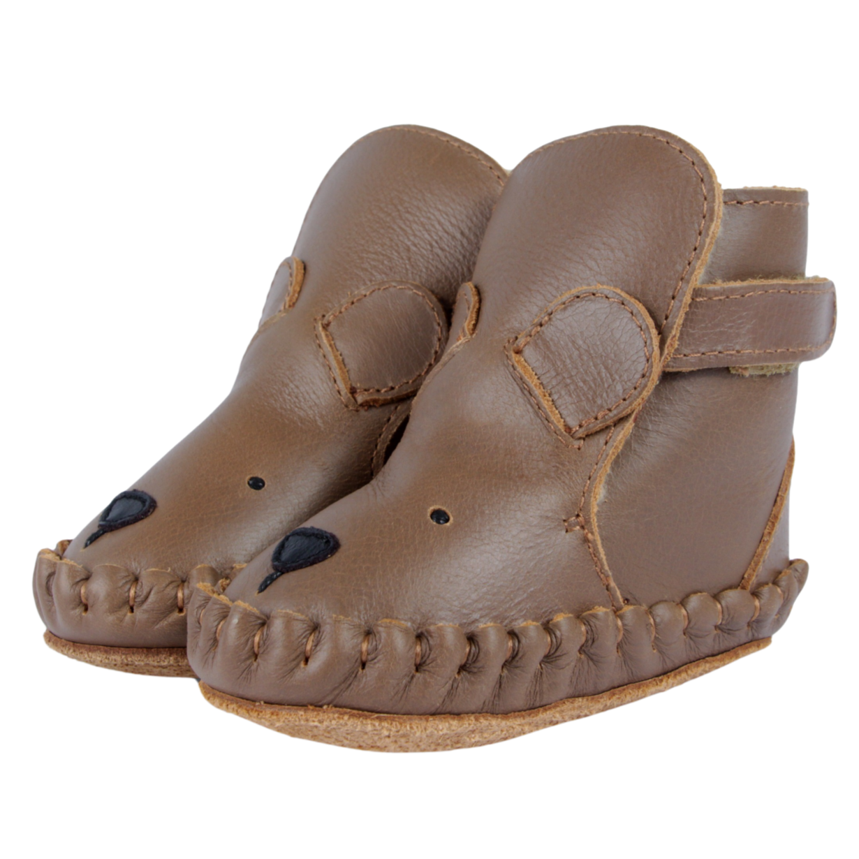 Leren wol gevoerde slofjes in de vorm van een beer voor baby's van het merk Donsje.