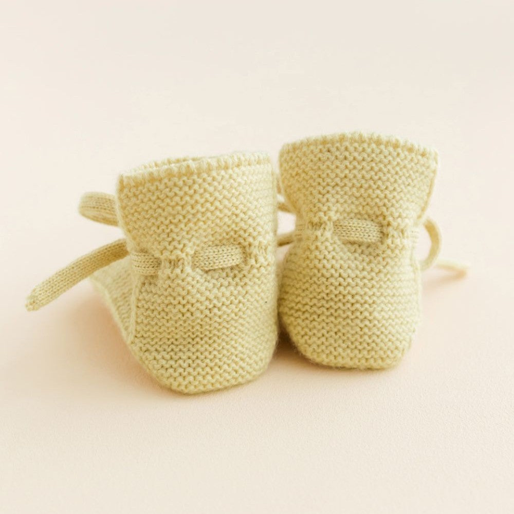 achterzijde booties licht geel