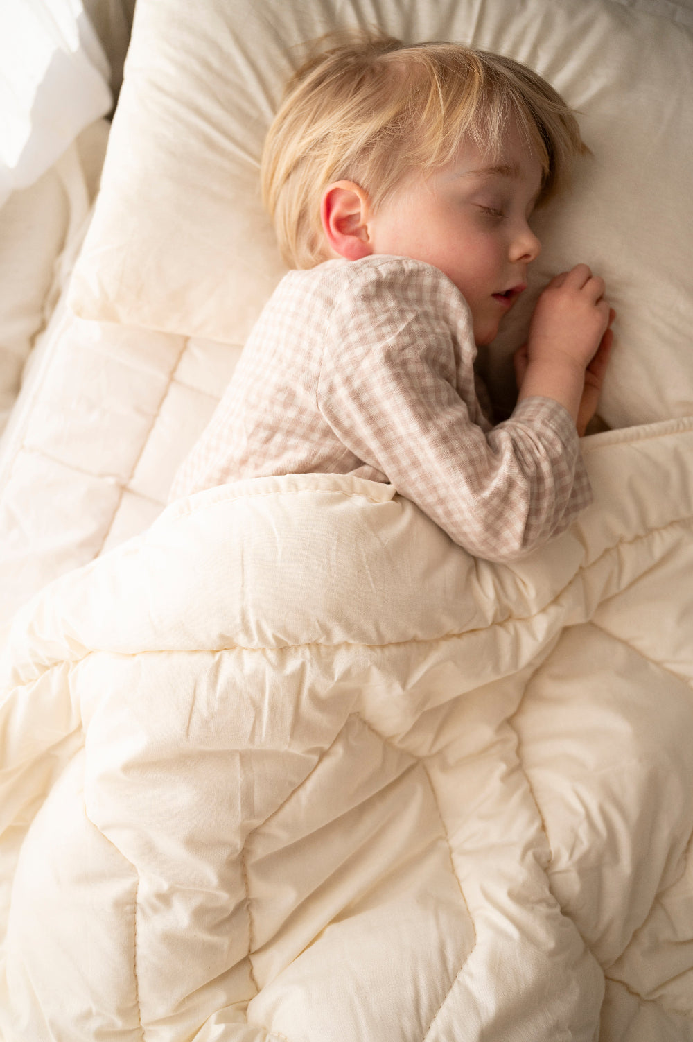 Dekbed 100% merinowol slapend kind