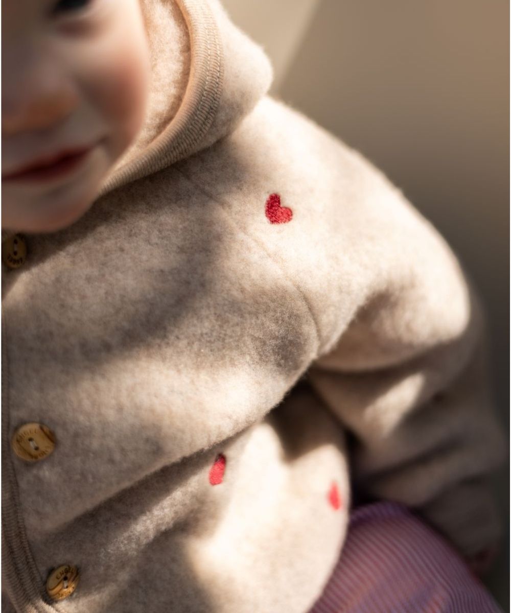 Veste polaire à cœurs sable édition limitée