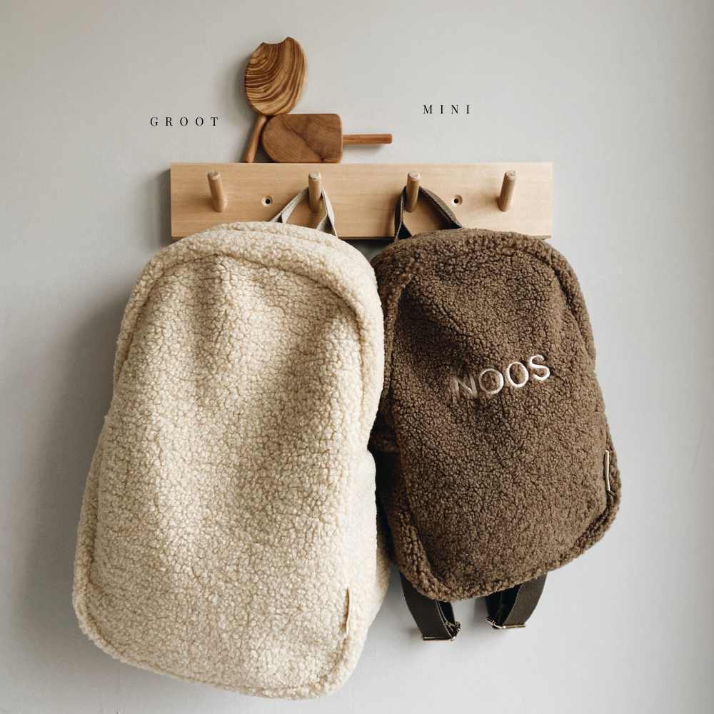 Personalized rugzak teddy verschil in formaat.