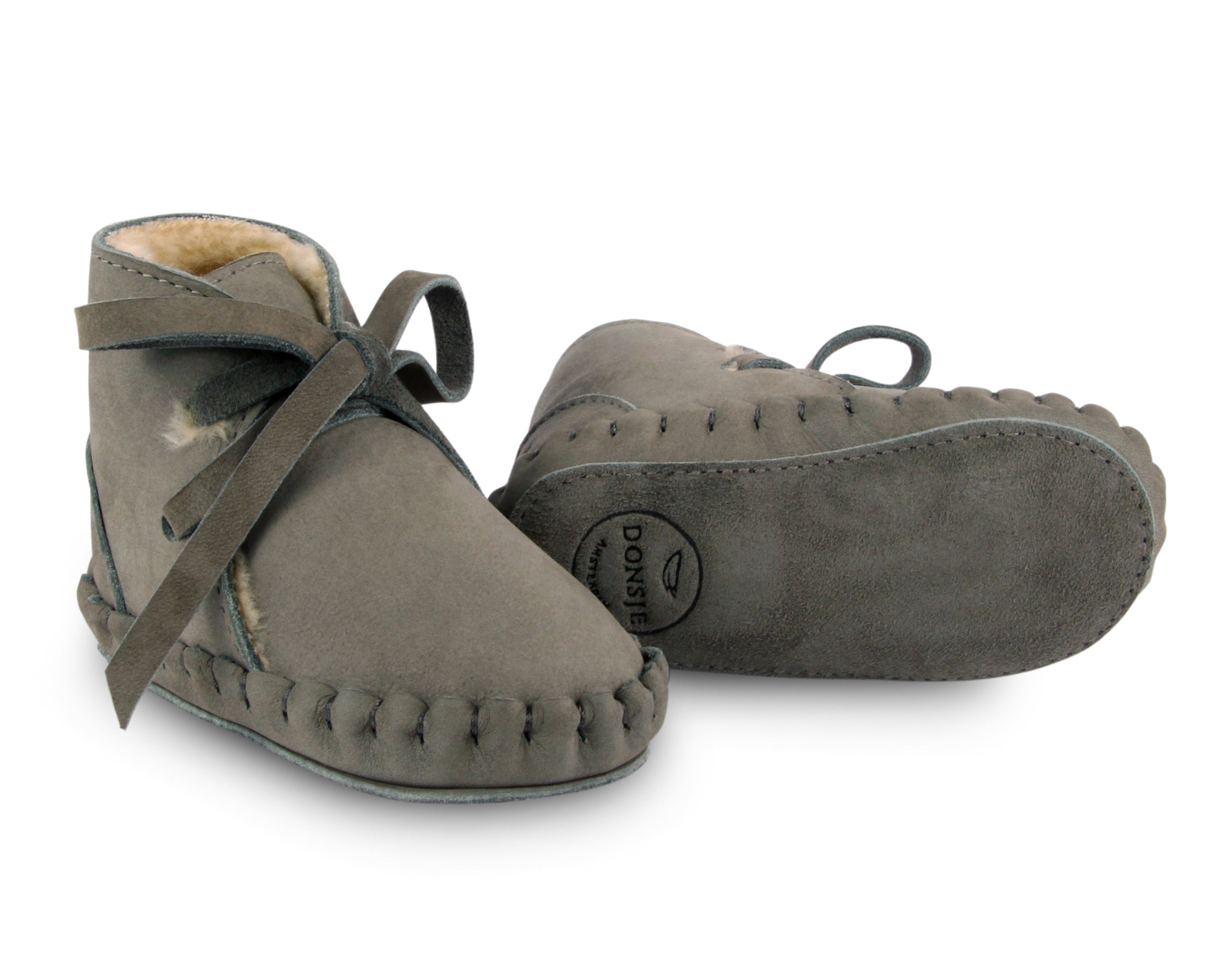 wol gevoerde slofjes voor baby's / kinderen in het groen van donsje.