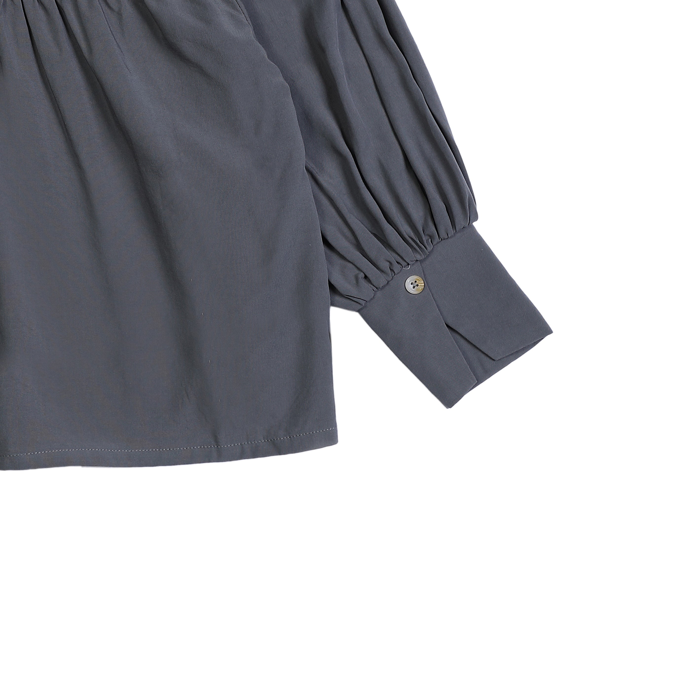 Blauwe blouse met twee knoopjes voor kinderen van Donsjje