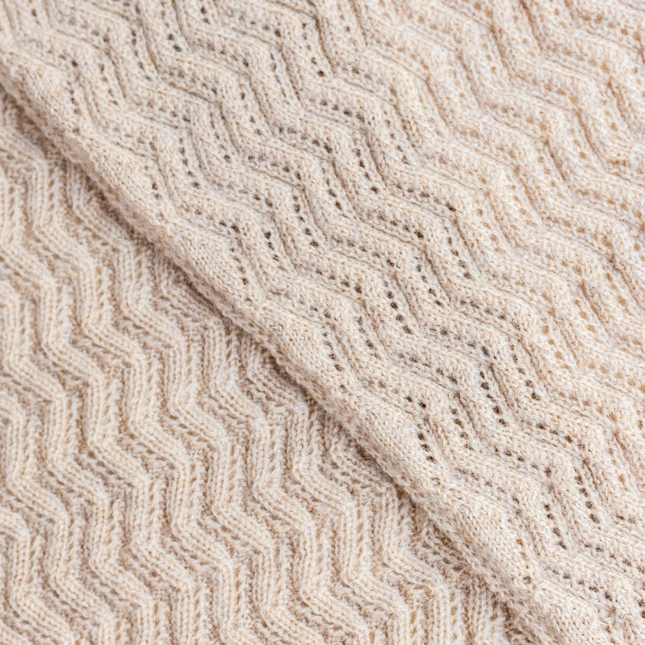 Gebreide sjaal voor baby's kinderen in de kleur sand van HVID.