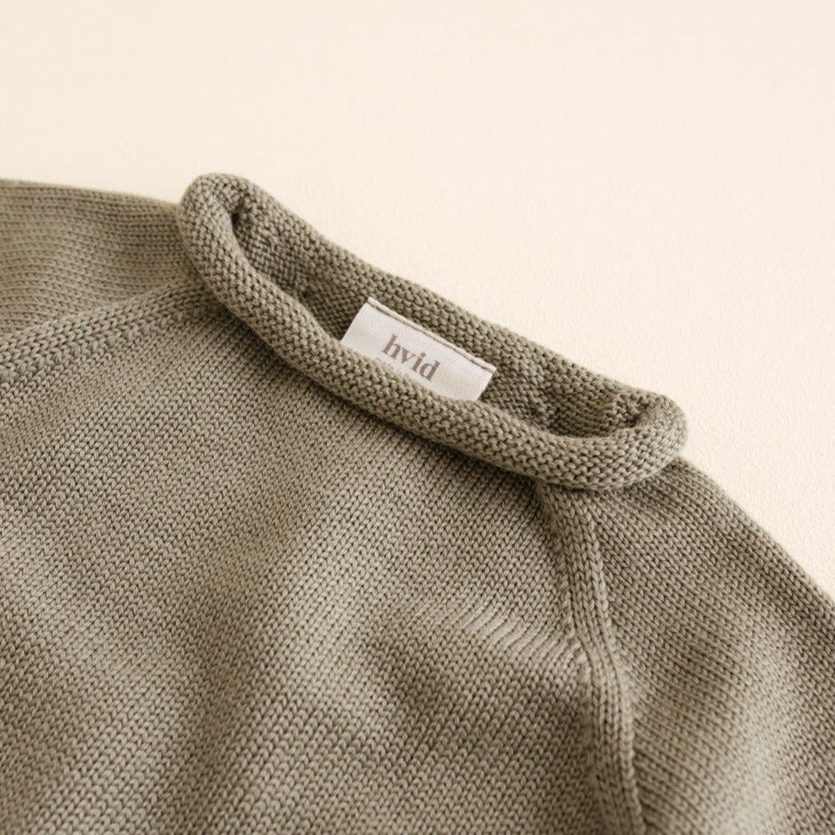 Gebreide trui voor baby's in de kleur groen van HVID.