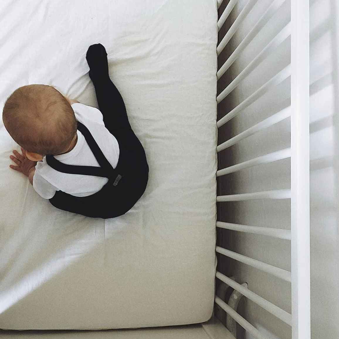 Mile Maillot met bretels en voetjes zwart