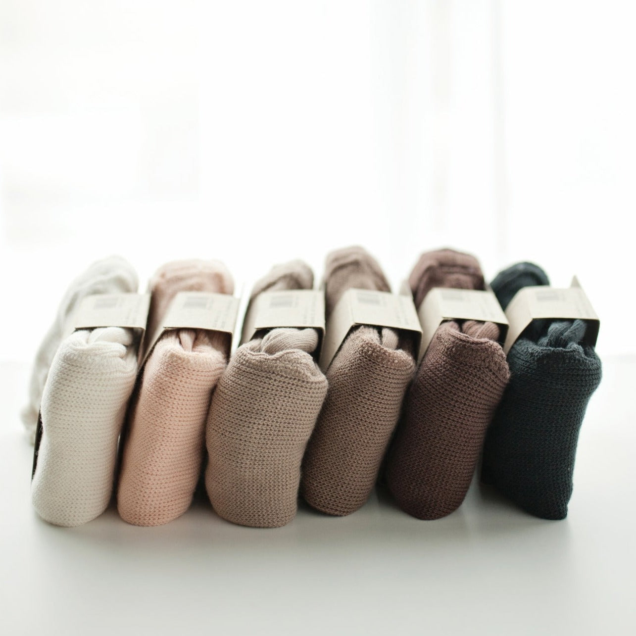 Mile Maillot met bretels en voetjes creamy