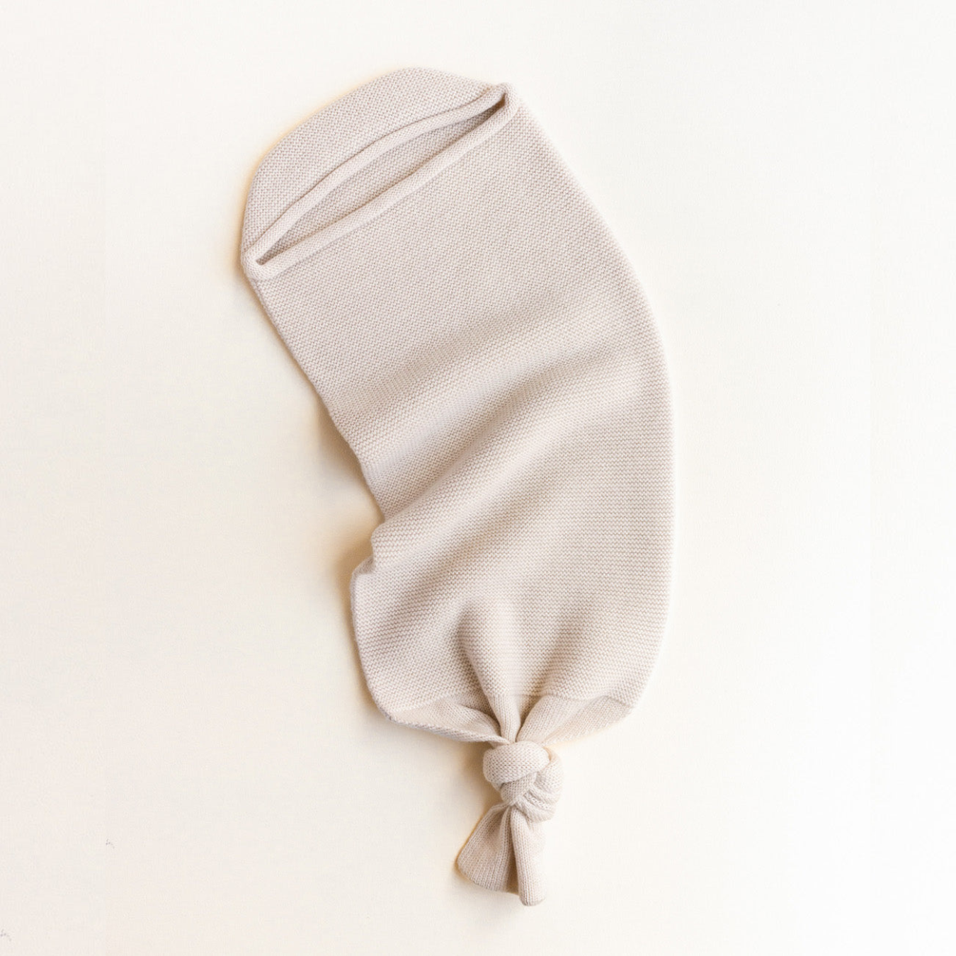 Cocoon cream Hvid voorzijde bovenzijde naar rechts.