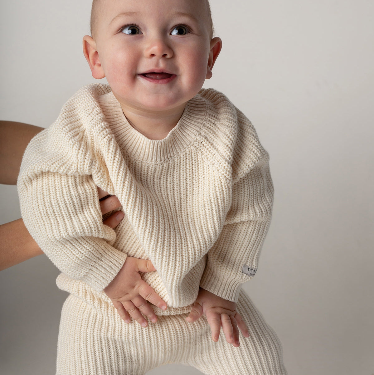 Donsje jade sweater macaroon aan bij baby