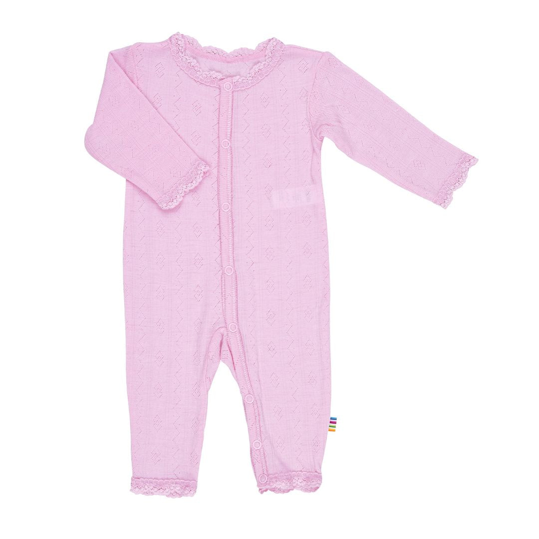 Wollen jumpsuit in de kleur rose voor baby's van het merk Joha.