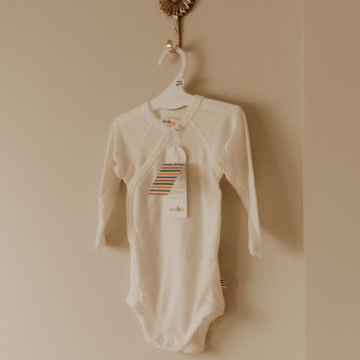 Wikkelromper merino wol naturel op haakje