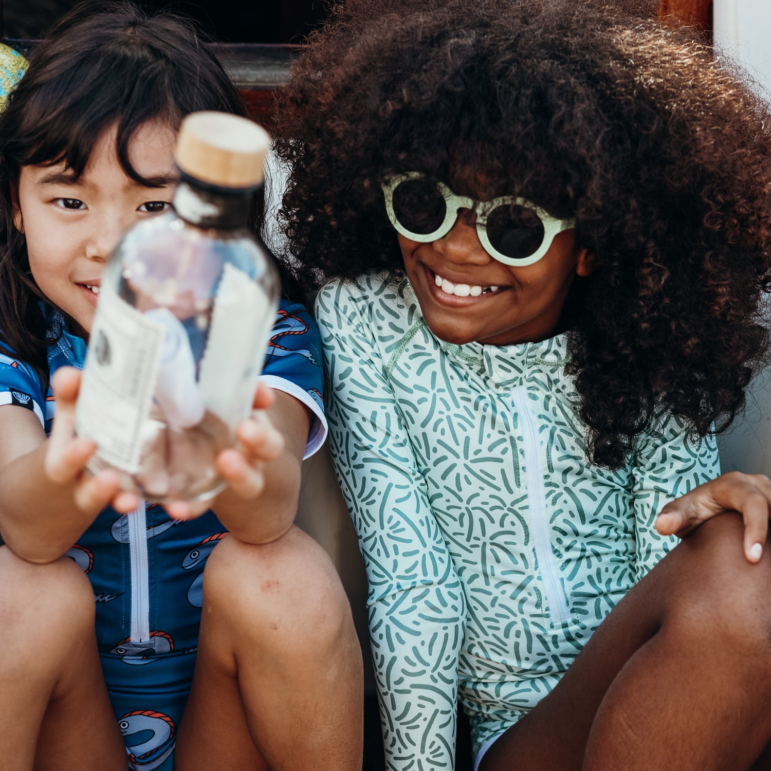 UV zwempak voor een meisje met lange mouw en een patroon erop