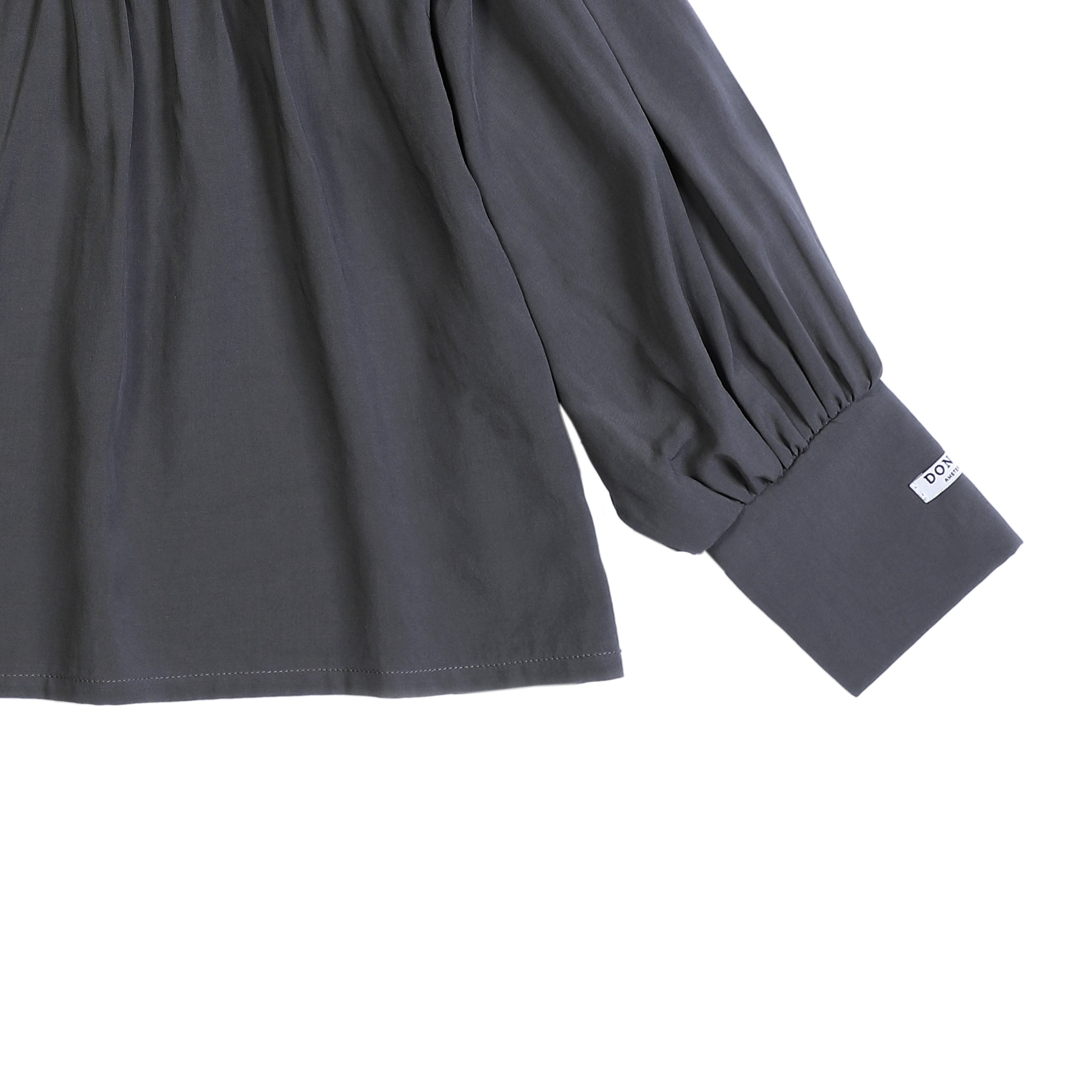 Blauwe blouse met twee knoopjes voor kinderen van Donsjje